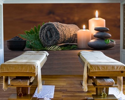 Ontspannende kaars en stenen massagesalon behang