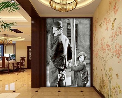 Charlie Chaplin en het kleine meisje behang