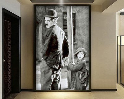 Charlie Chaplin en het kleine meisje behang