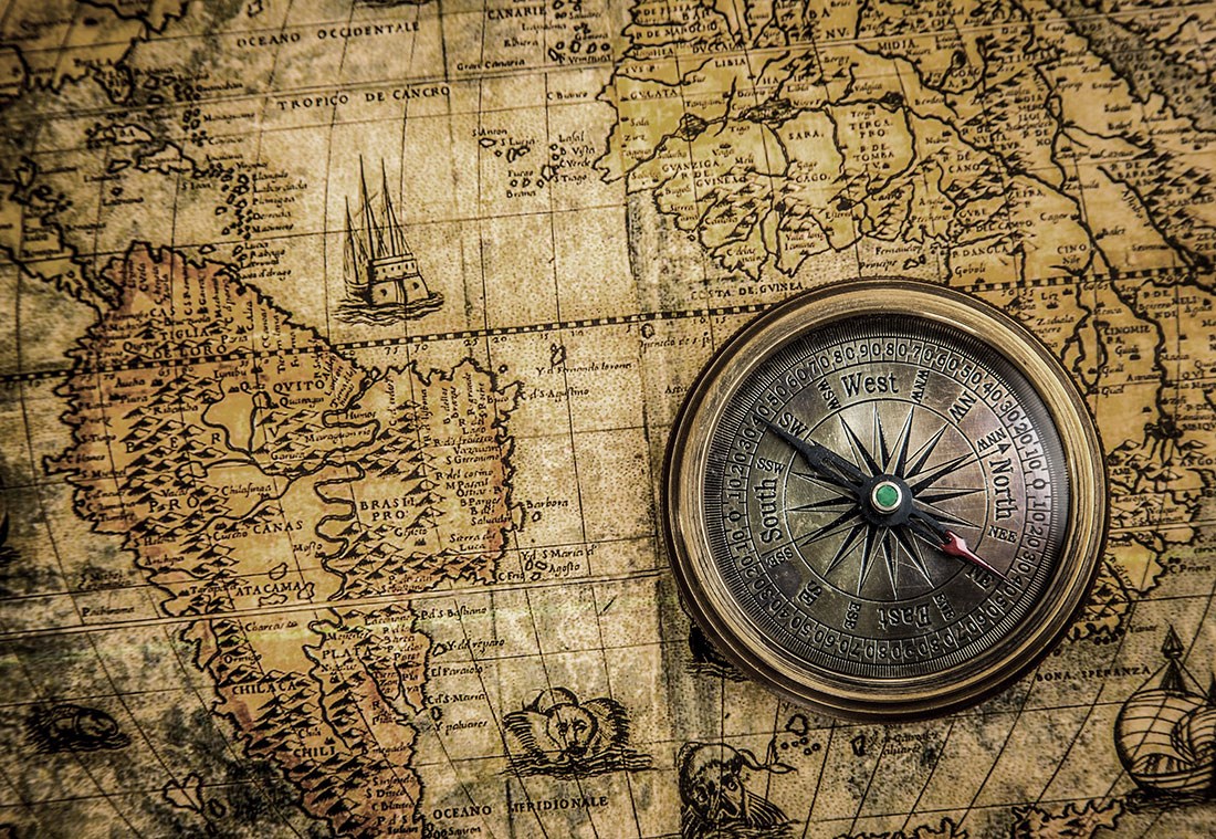 Oude wereldkaart met kompas behang