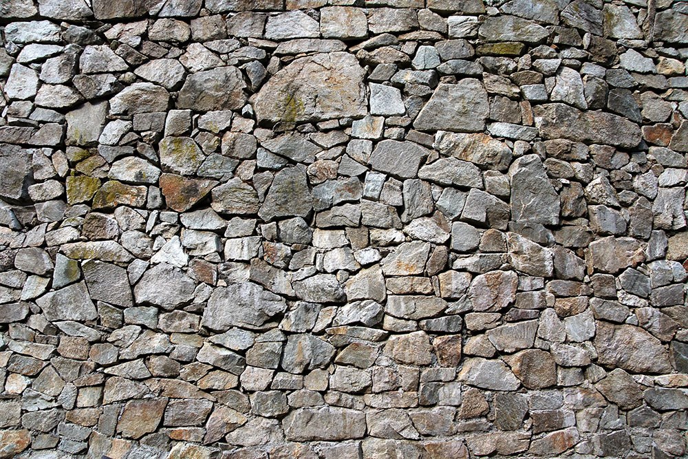 Stenen muur op zoek naar behang