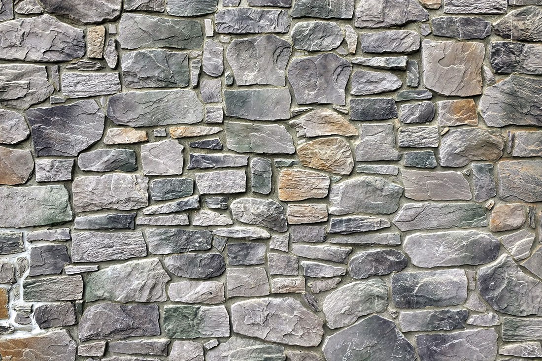 Stenen muur op zoek naar behang 