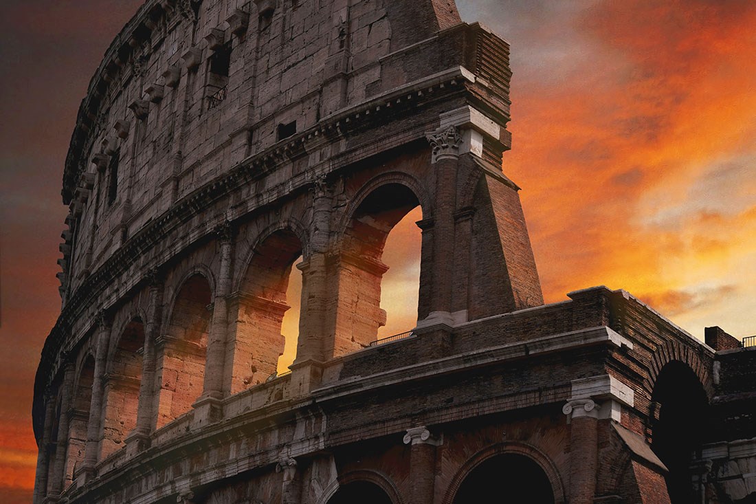 Romeinse Colosseum muurschildering bij zonsondergang