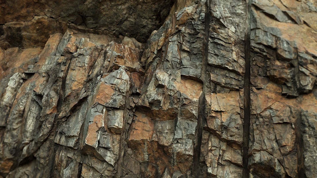 Steile rotswand geïllustreerd behang