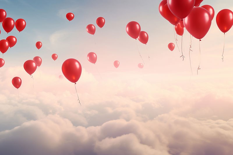 Vliegende rode ballonnen behang 