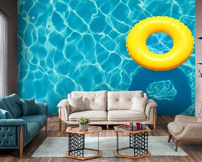 Zwembad en gele opblaasbare donutbehang