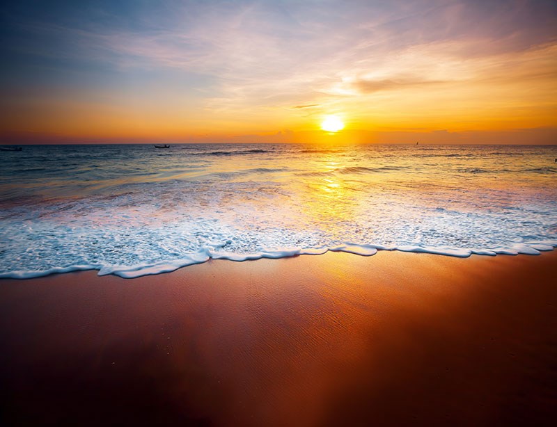 Zonsondergang en zeegezicht Behang 